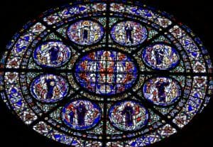 a very large stained glass window in a building