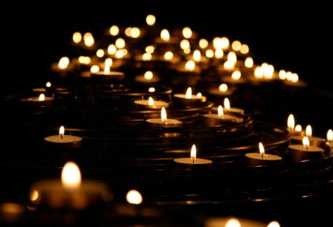 low-angle photo of lightened candles